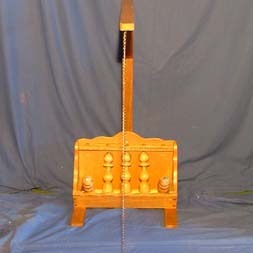 Les Quilles - 
But : Avec la balle attachée à une chaine vous devez essayer de faire tomber les 5 quilles 