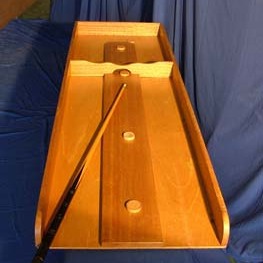 Le Billard - 
But : à l’aide de la queue de billard, il faut lancer le palais sur le nombre de points souhaités.