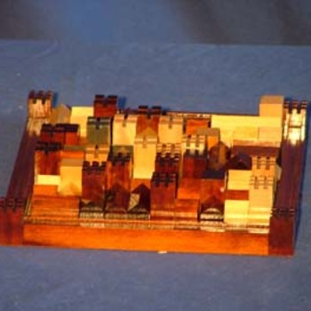 Cathédrale - 
But : Placer tous ses bâtiments ou une plus grande surface de bâtiments que l'adversaire dans l'enceinte de la ville.