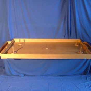 Le Foot - 
But : en s’aidant de la manette ,  faire glisser le palet et mettre des buts chez l’adversaire