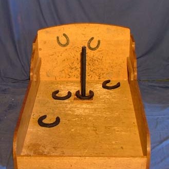 Fer à cheval - 
But : réussir à encercler la tige avec le fer à cheval